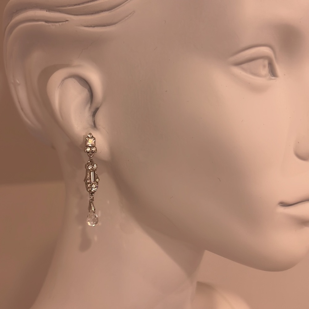 Sample pristine earrings rhodium plated Swarovski Crystal inlay. NWT